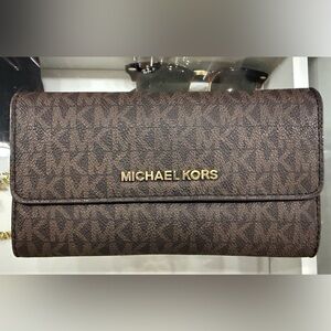 Michael Kors Jet Set Large Logo Trifold Wallet in brown